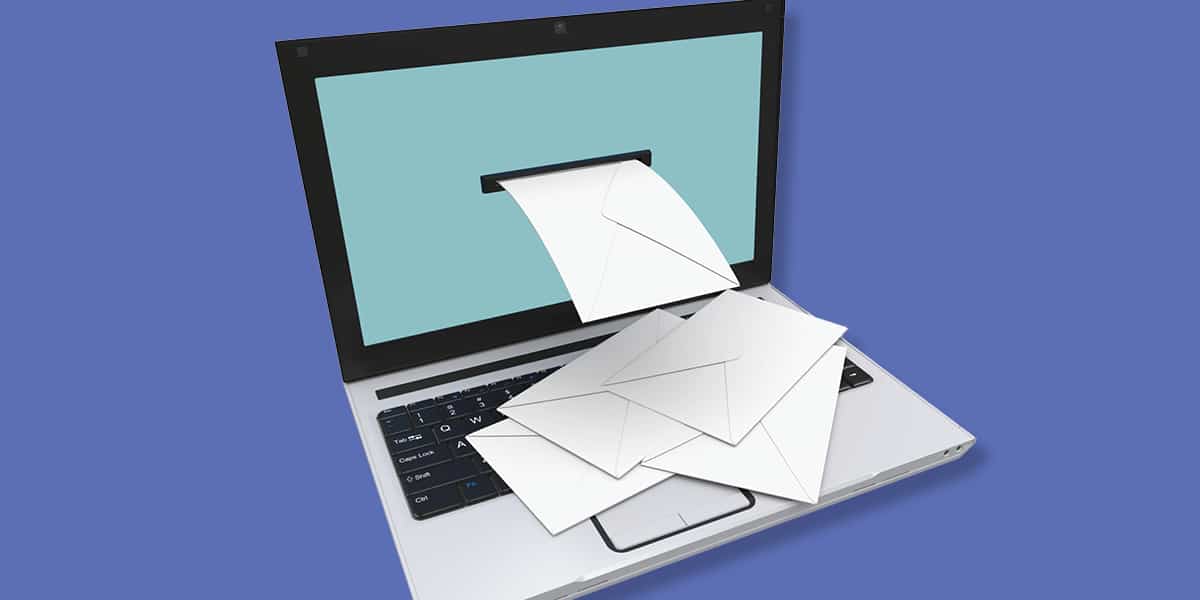 Illustration of a laptop with several white envelopes coming out of a mail slot in the screen, symbolizing emails or digital messages being received. The background is solid blue.