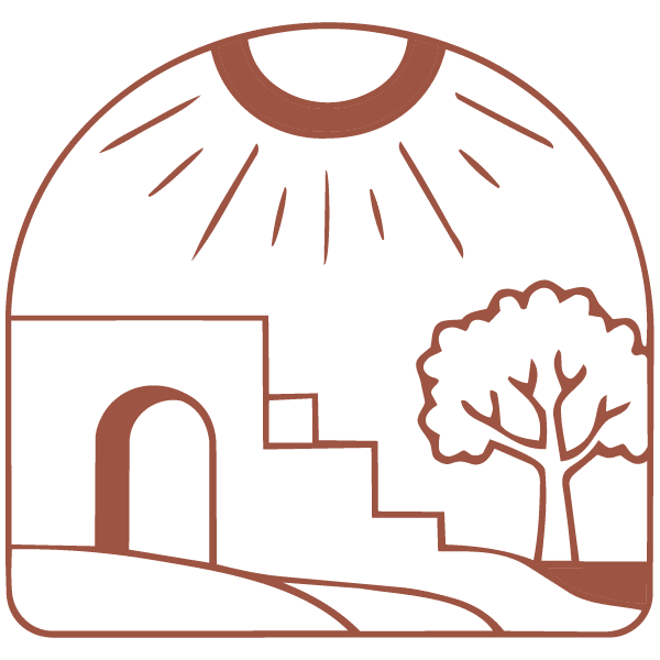 Minimalist line drawing of a sun shining over a building with an arched doorway, steps, and a tree to the right, set against a simple landscape.